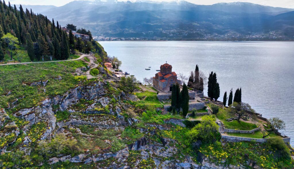 Beautiful view of the lake and the Church of Saint John the Theologian. Ohrid, North Macedonia.
